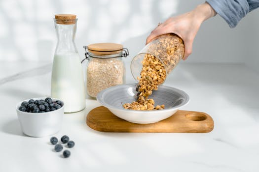 person taking vitamins with breakfast